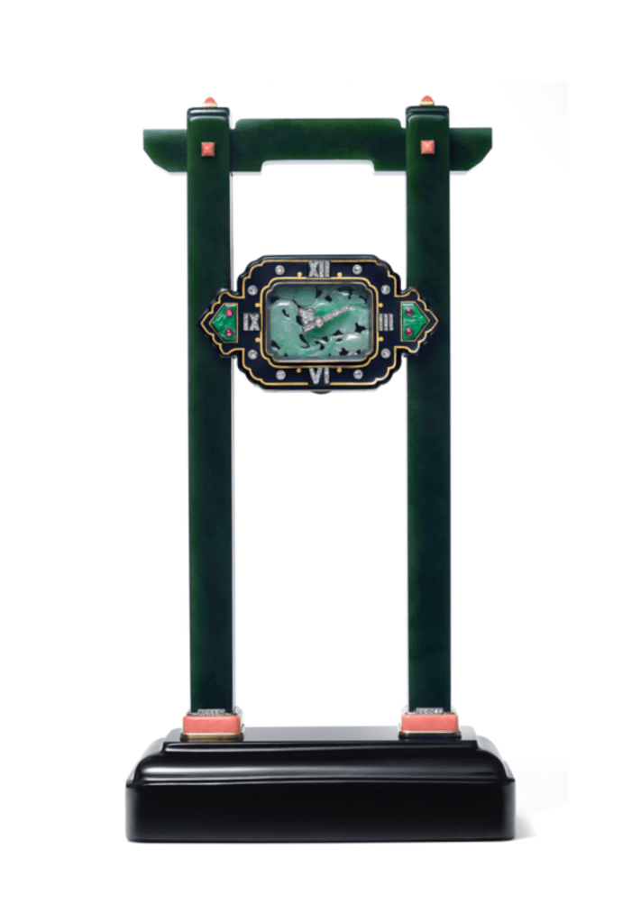 Cartier Paris, Portique gravity clock, 1927, Onyx (base), nephrite (columns and lintel), with platinum, gold, coral, jade, diamonds, rubies and enamel, 23 x 12.1 x 7 cm, Cartier Collection. Credit: Nils Herrmann, Cartier Collection © Cartier.